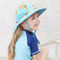 Il bambino espone al sole i cappelli di nuoto della spiaggia dell'estate dei bambini del cappuccio del cappello con la vendita all'ingrosso di Upf